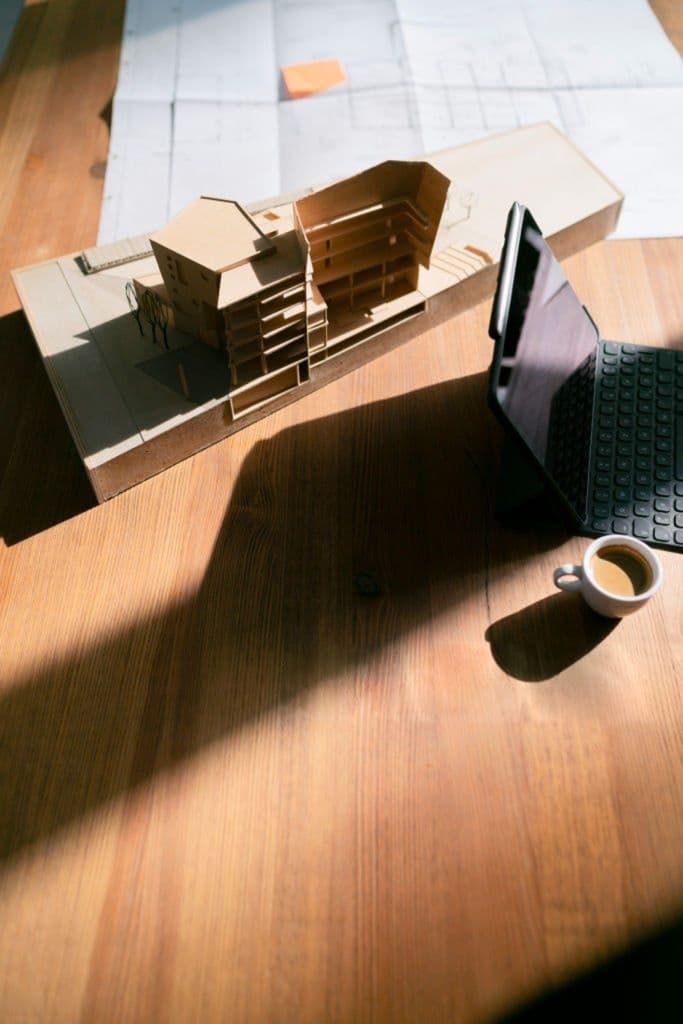 An architectural model on a desk in hard afternoon sunlight